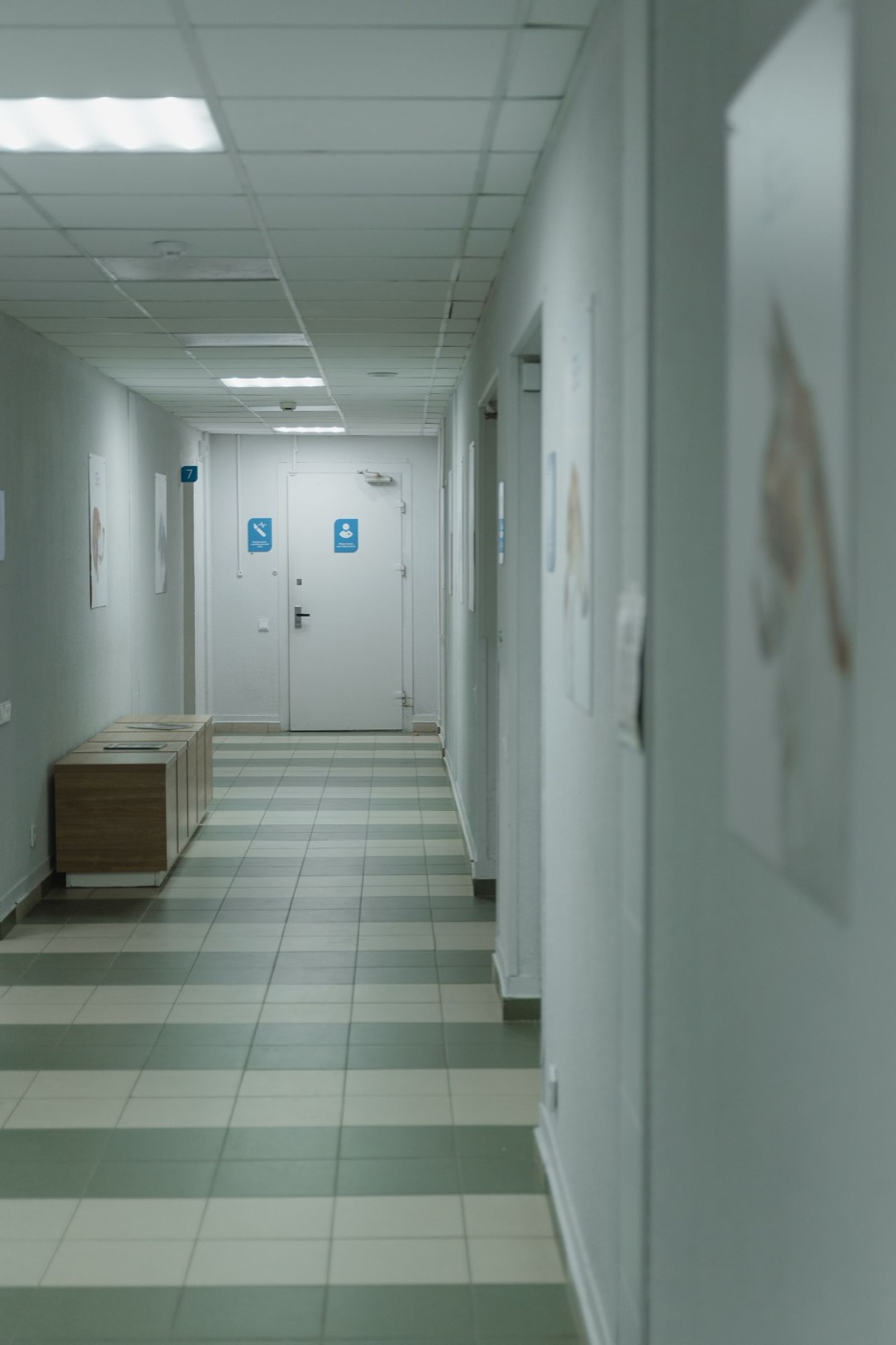Quiet, well-lit corridor of a medical office suite